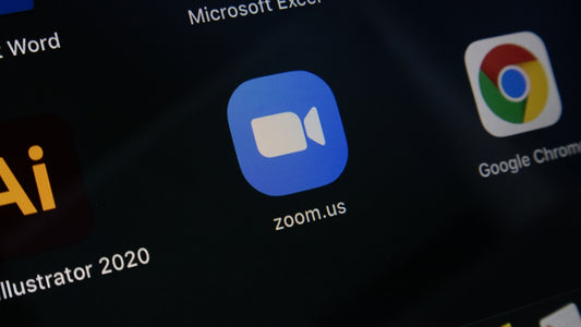 Close-up of computer screen showing zoom.us app icon alongside other software for the best software for football betting accuracy