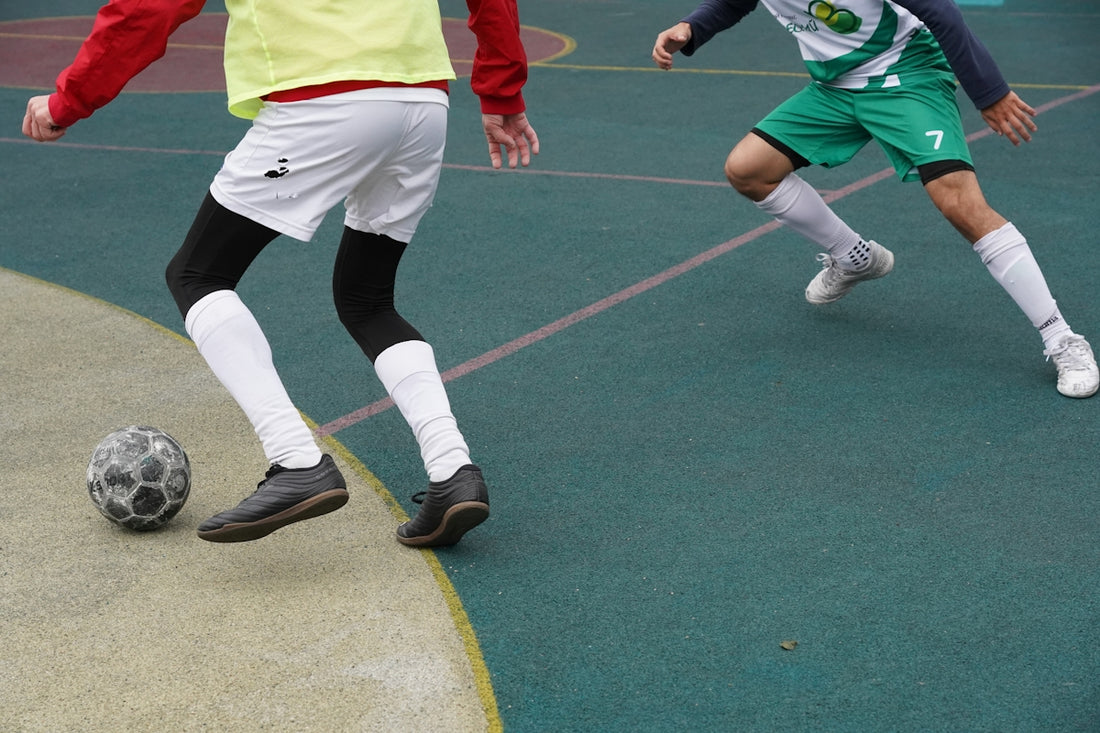 a group of people playing football